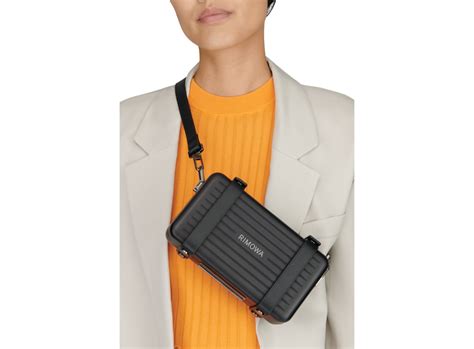 rimowa cross body bag.